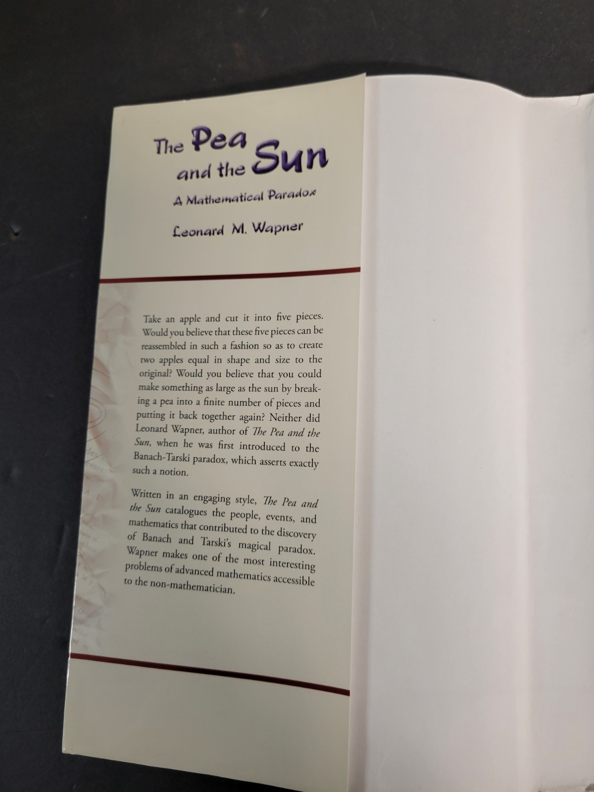 THE PEA AND THE SUN Mathematical Paradox by L. Wapner (2005, HCDJ) VERY GOOD