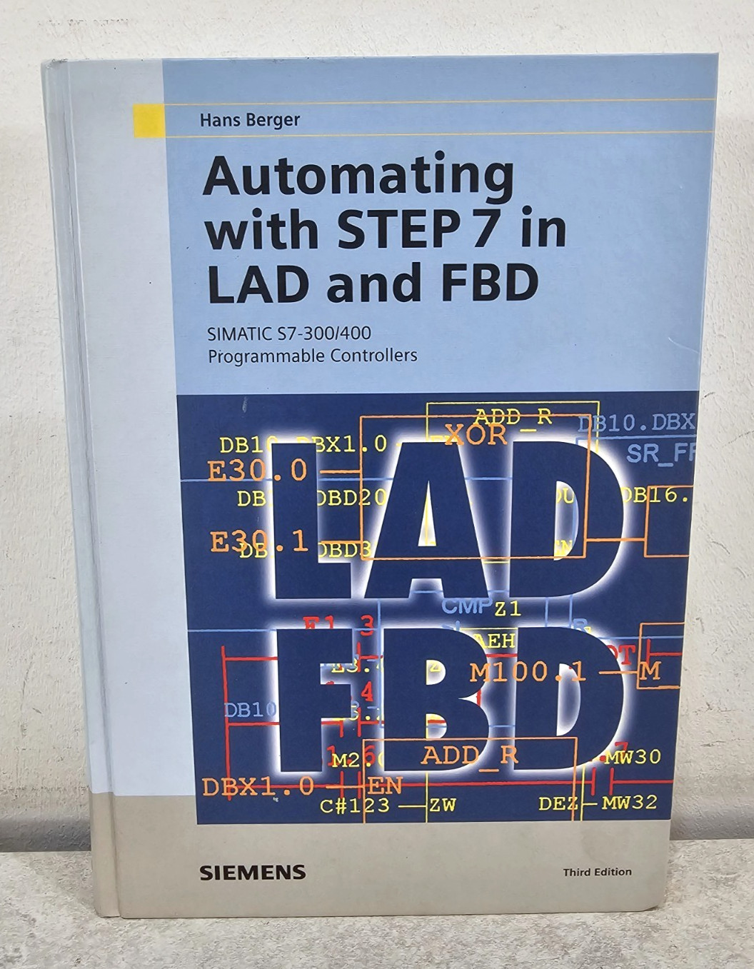 Automating with STEP 7 in LAD and FBD by Hans Berger Hardcover