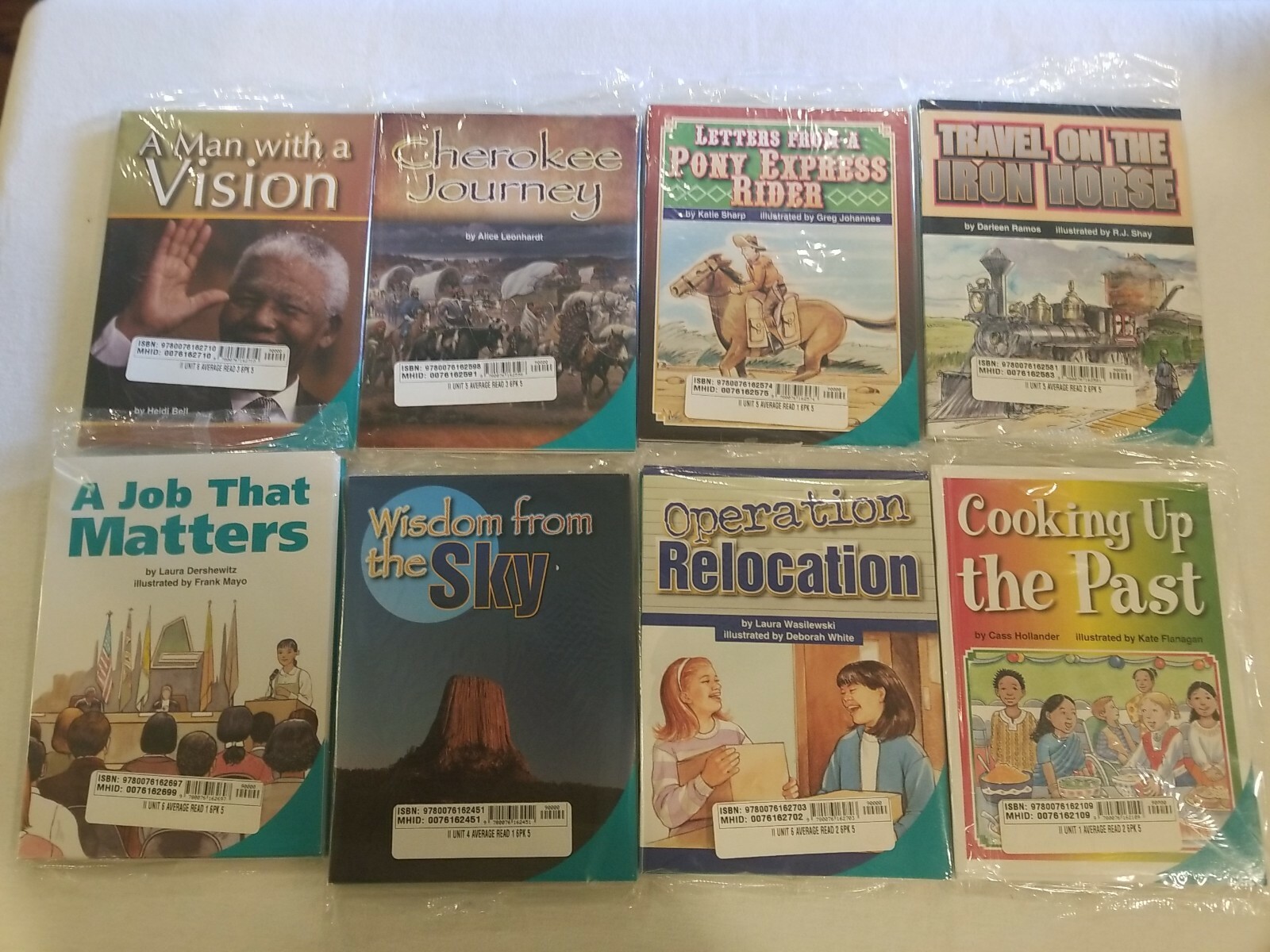 SRA MCGRAW HILL LOT OF EIGHT 6 PACKS OF AVERAGE READING SOFTCOVER BOOKS NIP