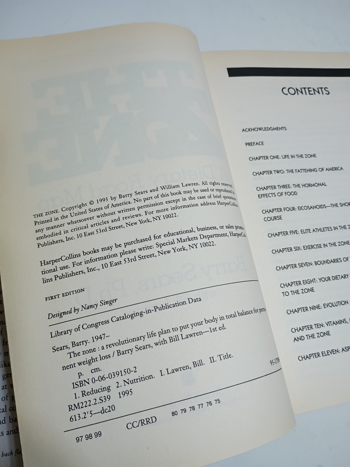 Enter The Zone: A Dietary Road map , Barry Sears. Hardcover with a dust jacket