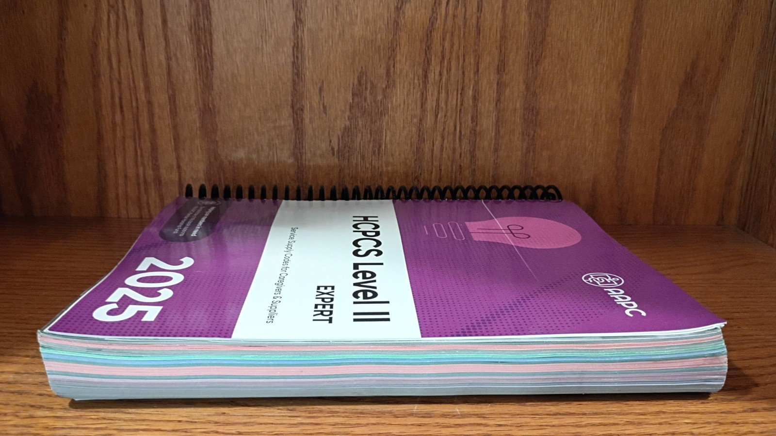 AAPC HCPCS Level II Expert 2025 Spiral Textbook Medical Coding English