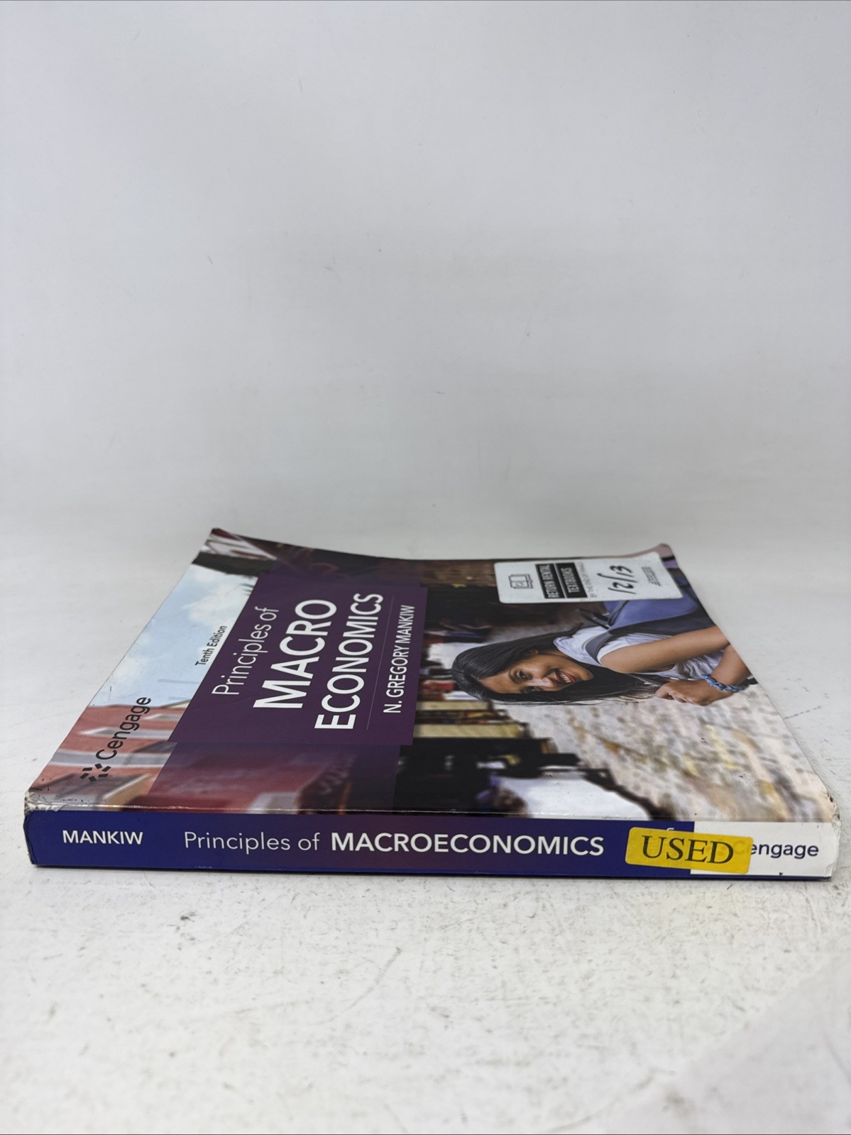 Principles of MacroEconomics 10th Edition *Back Cover Damage*