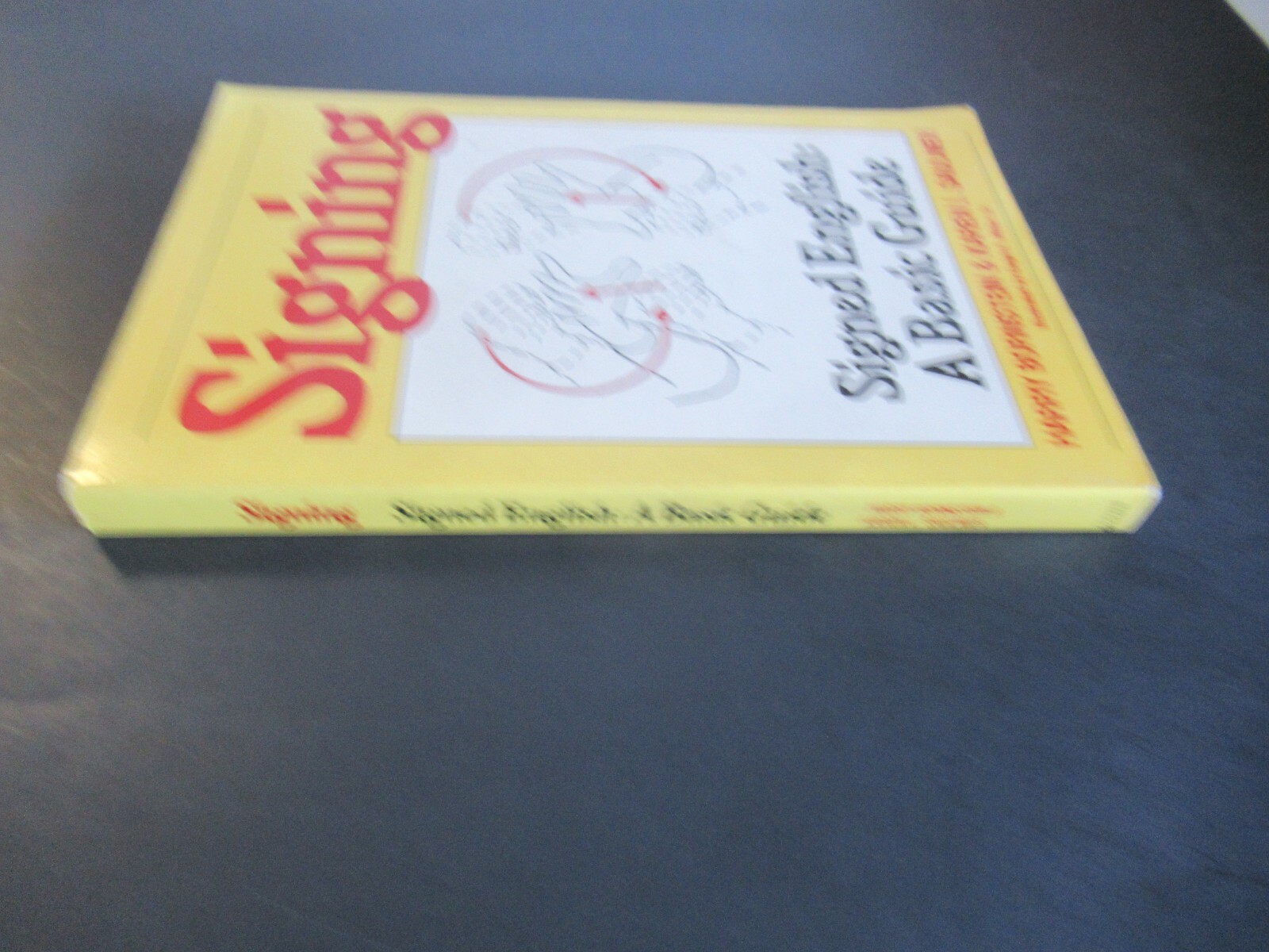 SIGNING-ENGLISH: A BASIC GUIDE BY HARRY BORNSTEIN & KAREN SAULNIER 1988a