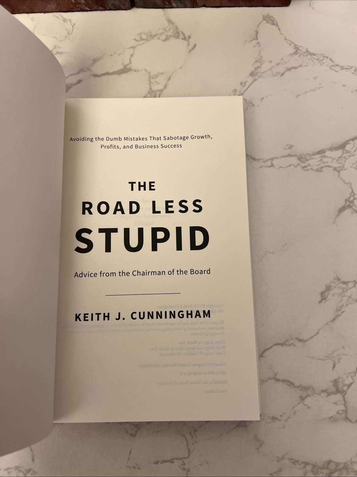 The Road Less Stupid By Keith J. Cunningham-2018 First Edition HCDJ
