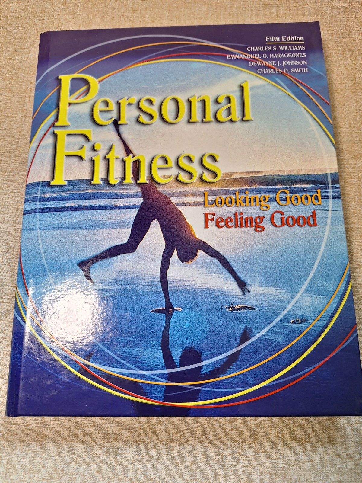 Physical Edu Personal Fitness Looking Good Feeling Good 5th edition textbook