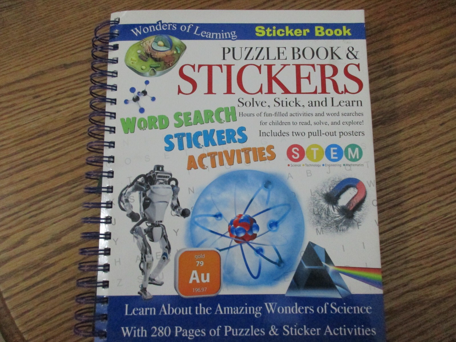Puzzle Book & Stickers-Solve, Stick, and Learn (Wonders of Learning)