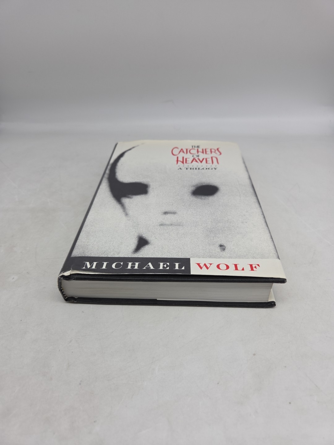 The Catchers of Heaven: Trilogy – (Michael Wolf, HCDJ, 1996, Second Printing)