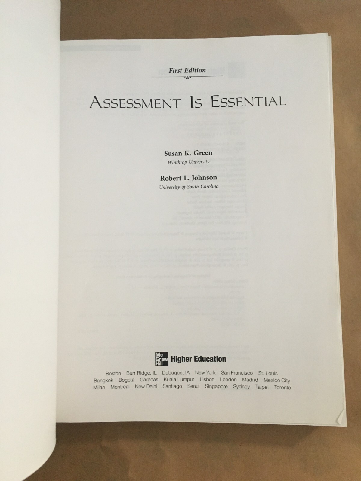 Assessment Is Essential by Johnson & Green, no markings, clean pages, ships free