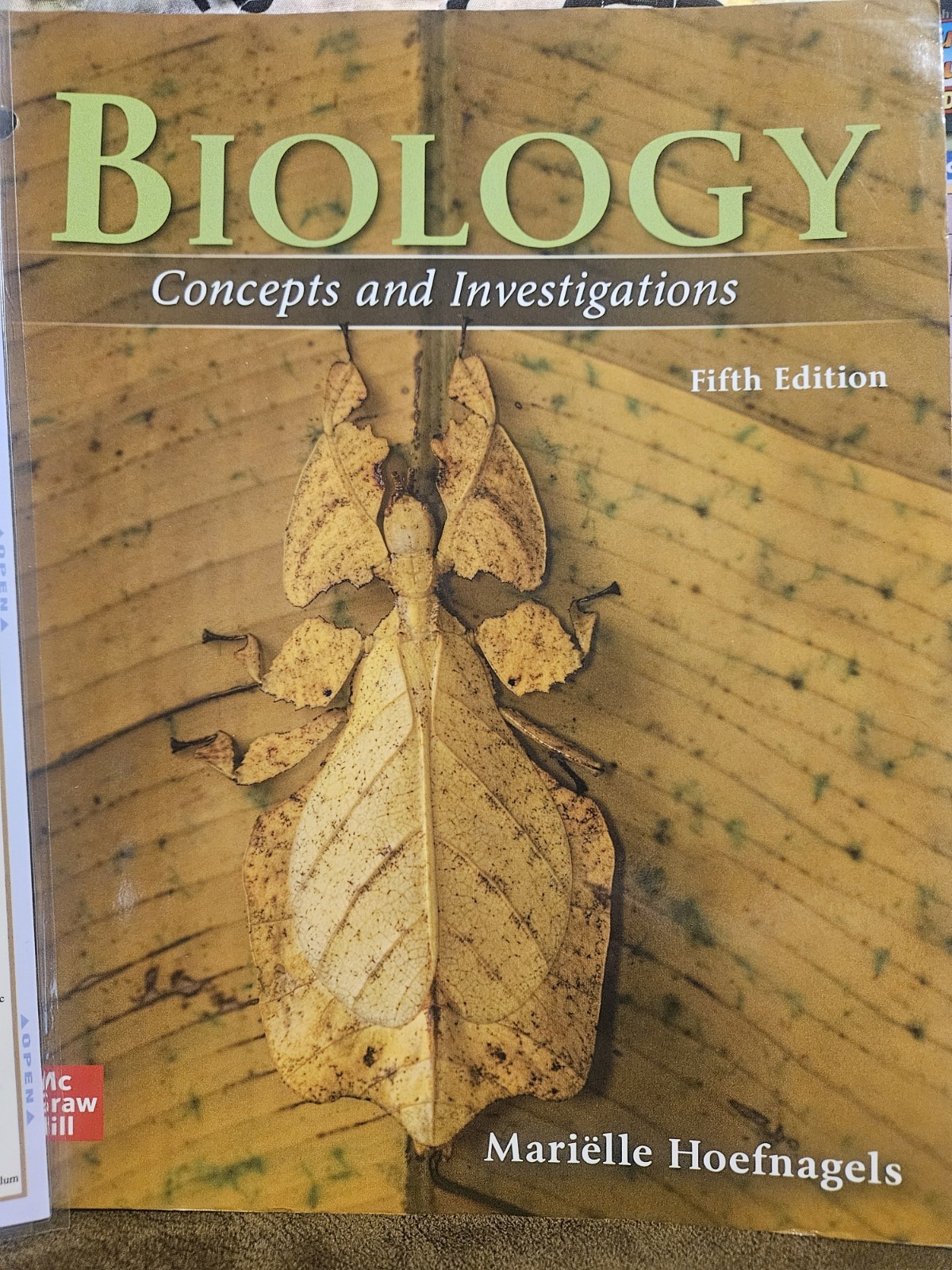 Loose Leaf for Biology: Concepts and Investigations by Mariëlle Hoefnagels..