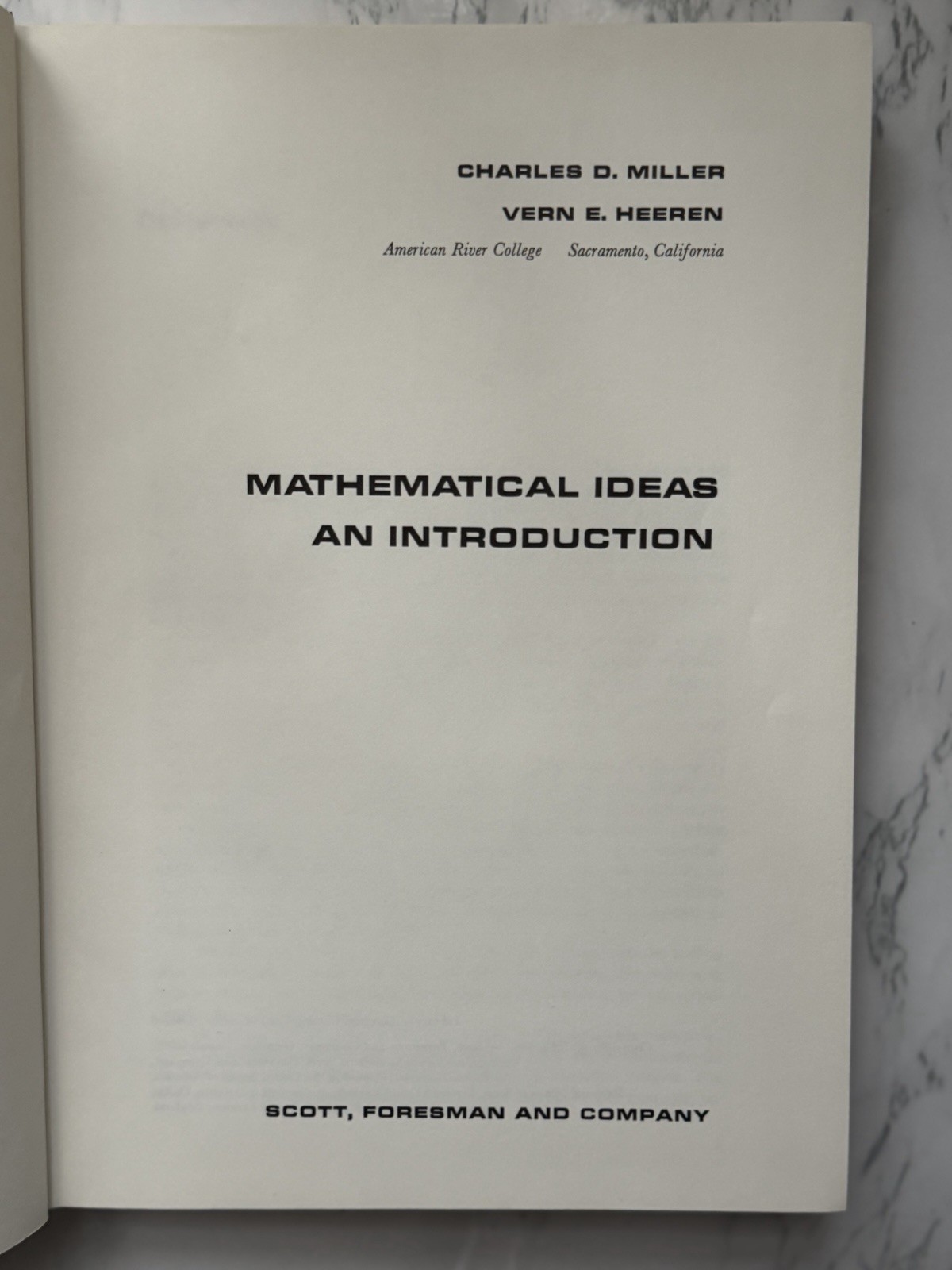 Mathematical Ideas: An Introduction by Vern E. Heeren and Charles Miller (1969)