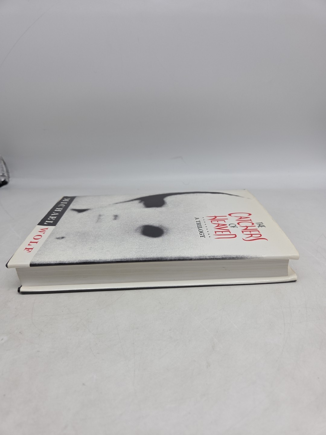 The Catchers of Heaven: Trilogy – (Michael Wolf, HCDJ, 1996, Second Printing)