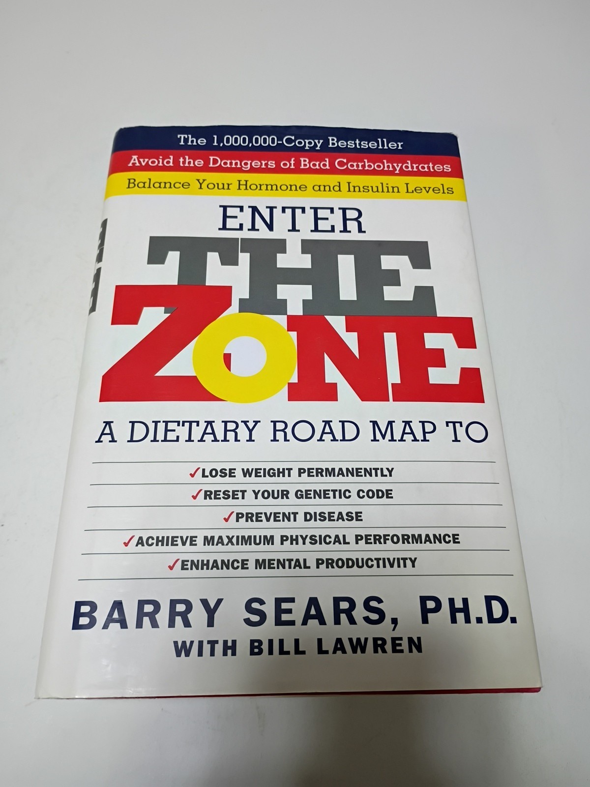 Enter The Zone: A Dietary Road map , Barry Sears. Hardcover with a dust jacket