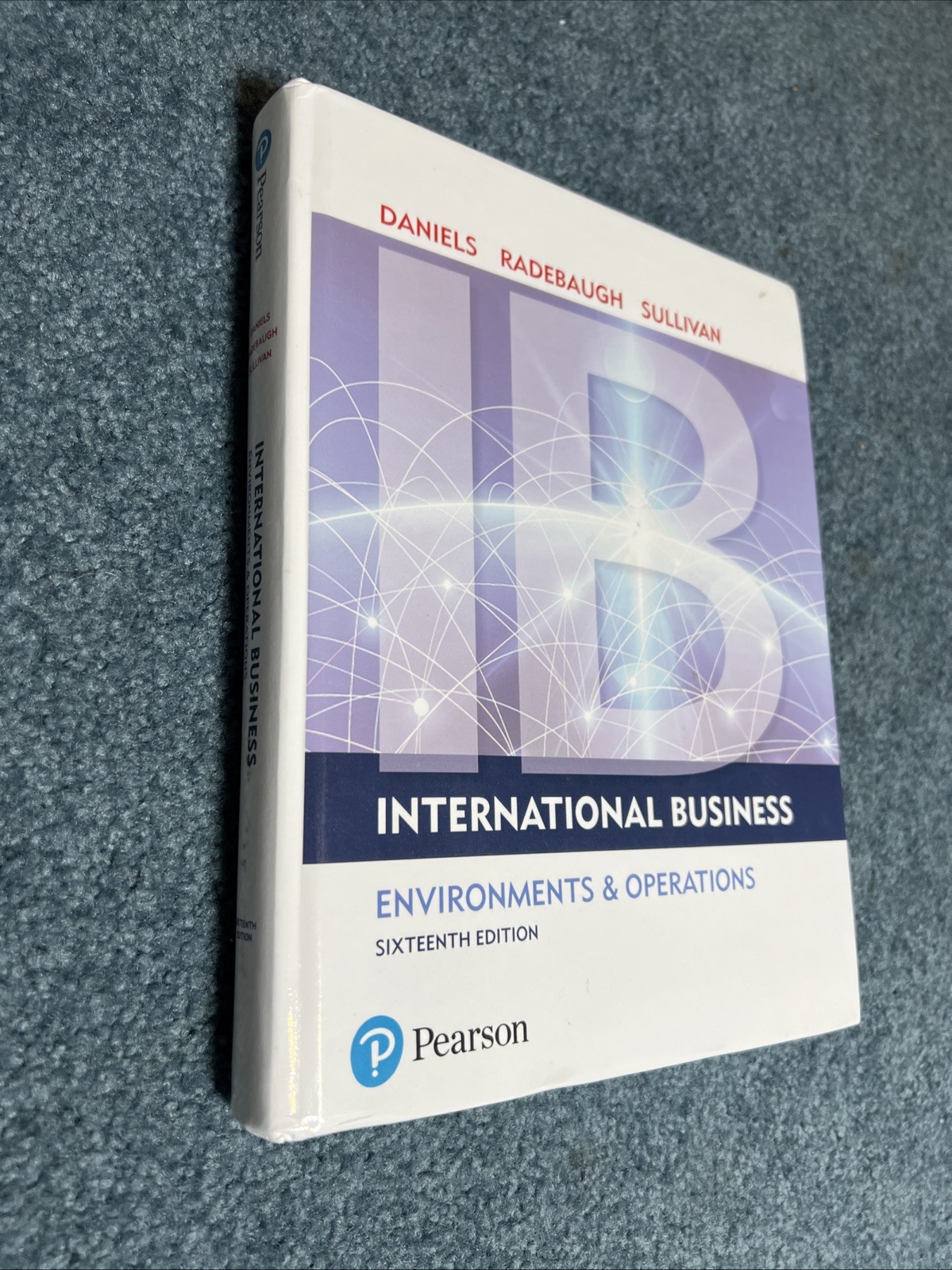 International Business (16th Edition) – Hardcover By Daniels, John – GOOD