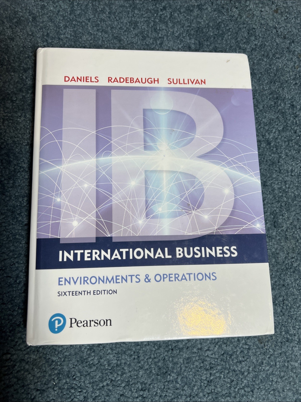 International Business (16th Edition) – Hardcover By Daniels, John – GOOD