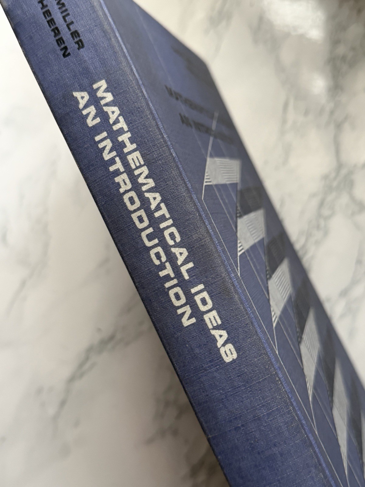 Mathematical Ideas: An Introduction by Vern E. Heeren and Charles Miller (1969)