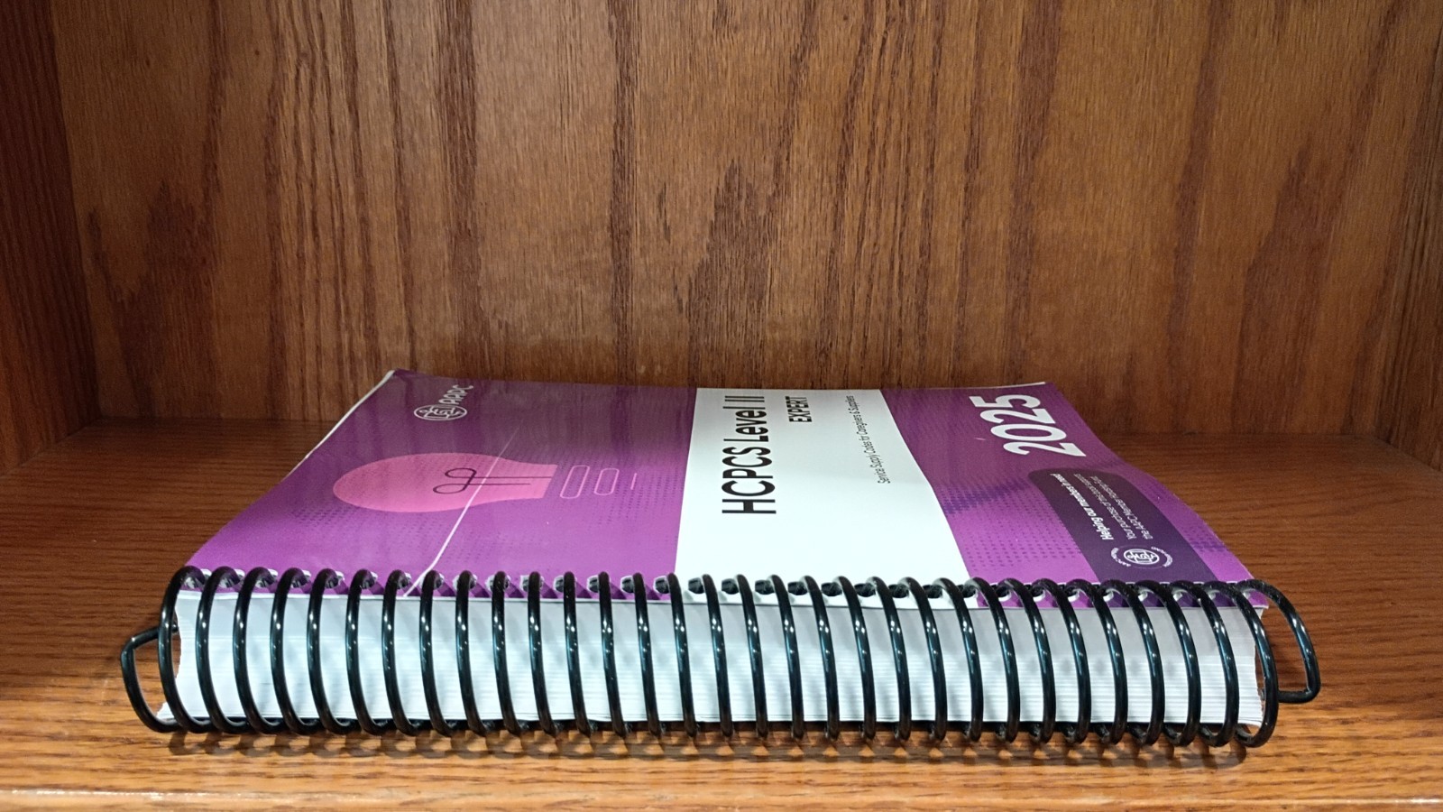 AAPC HCPCS Level II Expert 2025 Spiral Textbook Medical Coding English