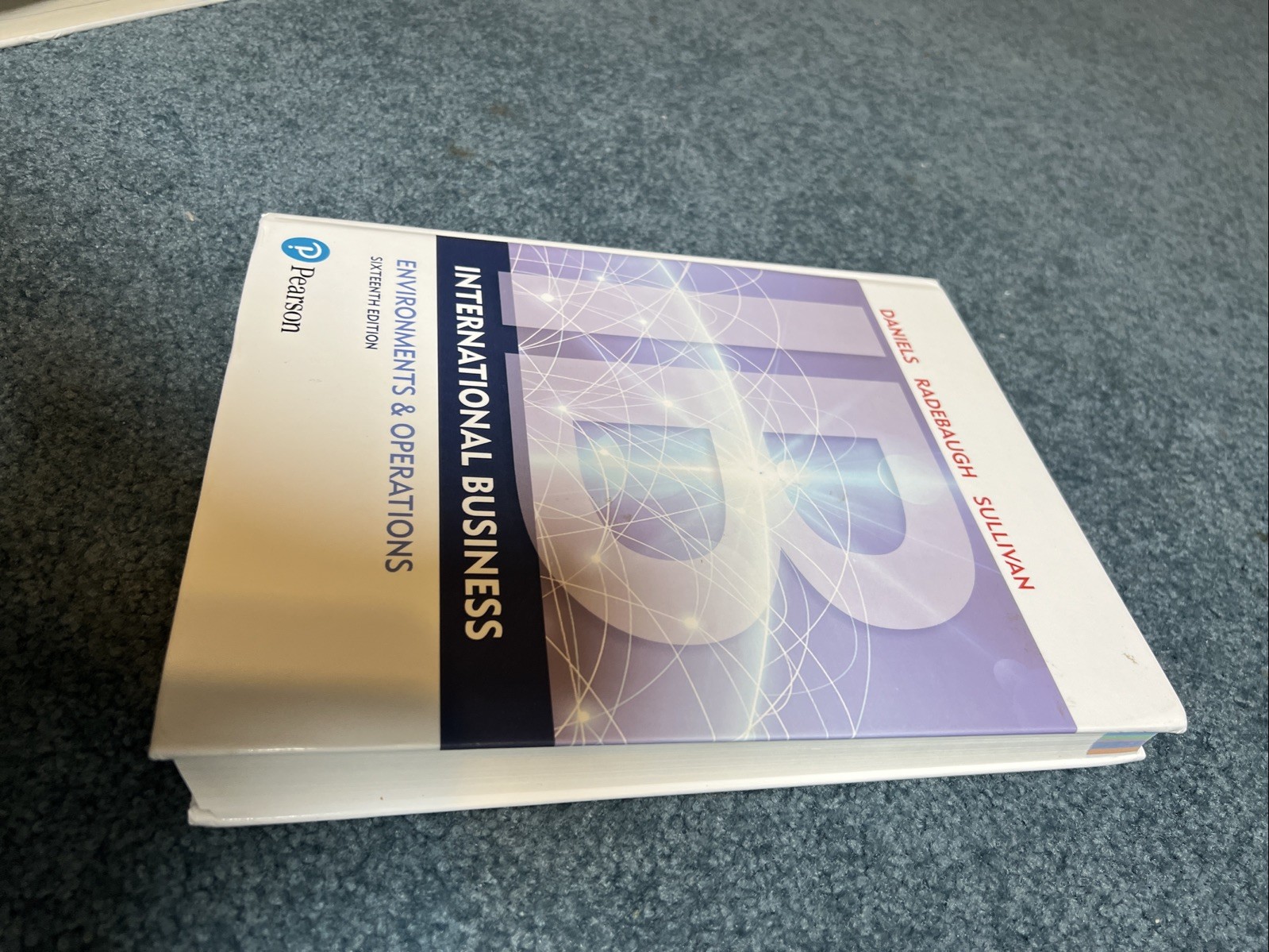 International Business (16th Edition) – Hardcover By Daniels, John – GOOD
