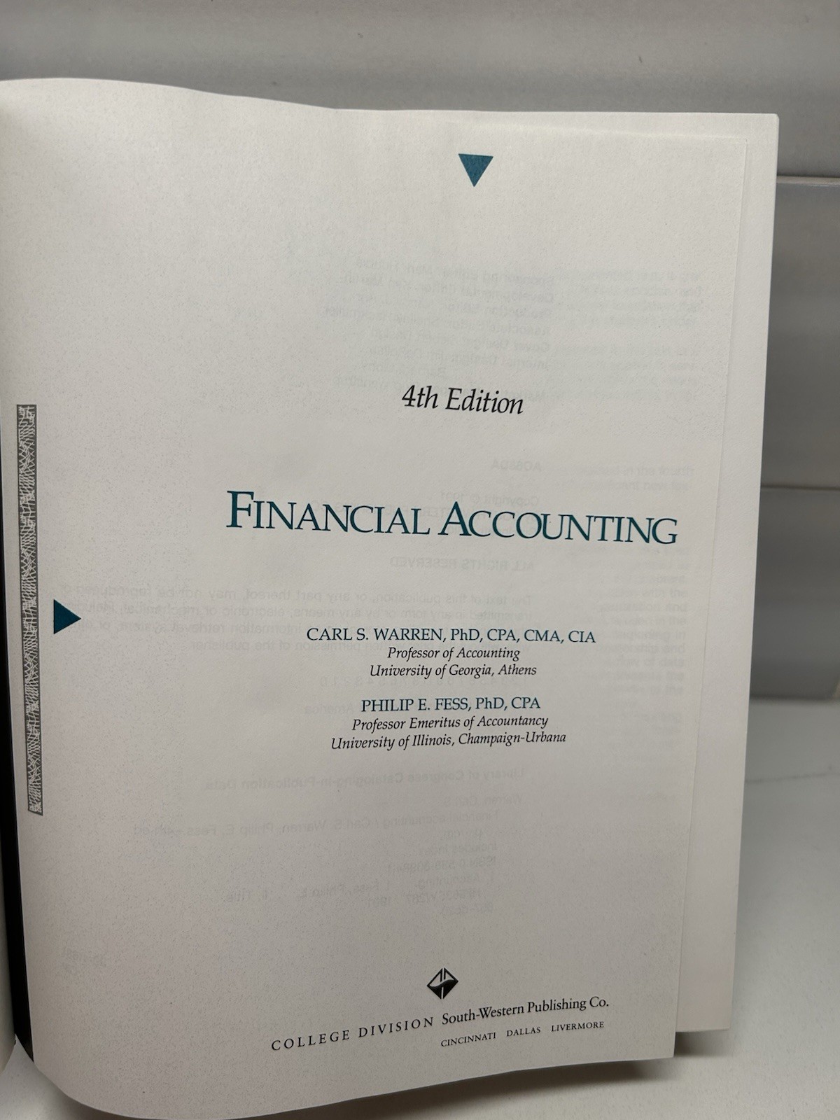 Financial Accounting – Hardcover, by Warren and Fess – 4th Edition SKU F3