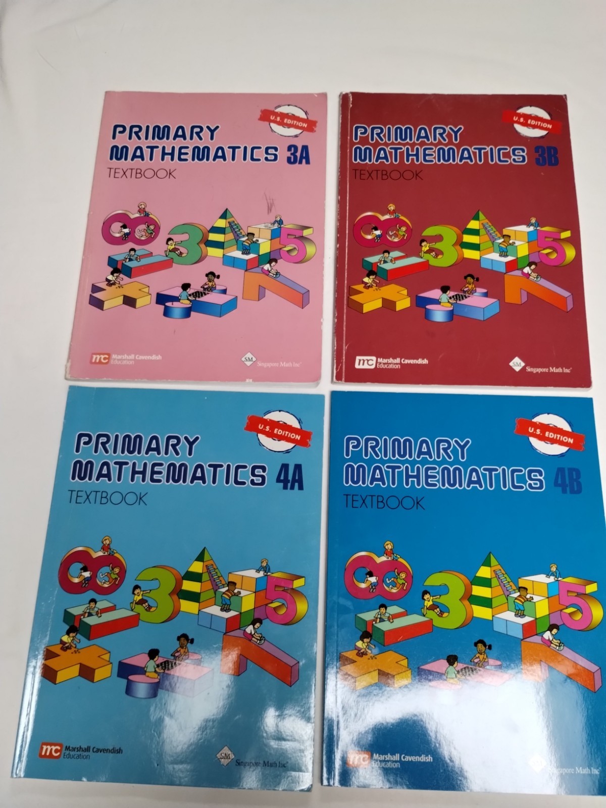 (4) Primary Mathematic Textbooks: 3A, 3B, 4A, 4B by Singapore Math Inc. 2014 PB