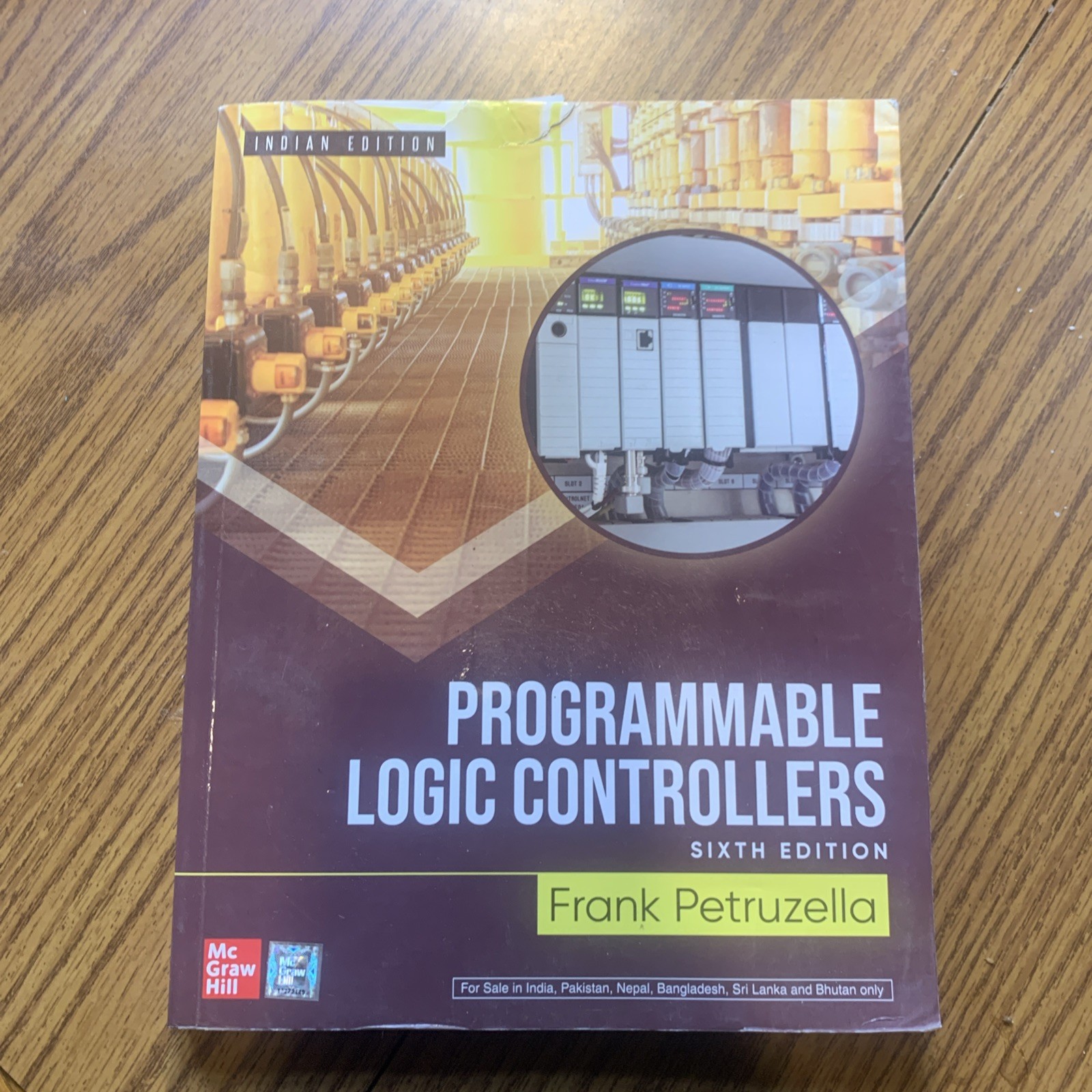 Programmable Logic Controllers by Frank D. Petruzella, 6th International Edition