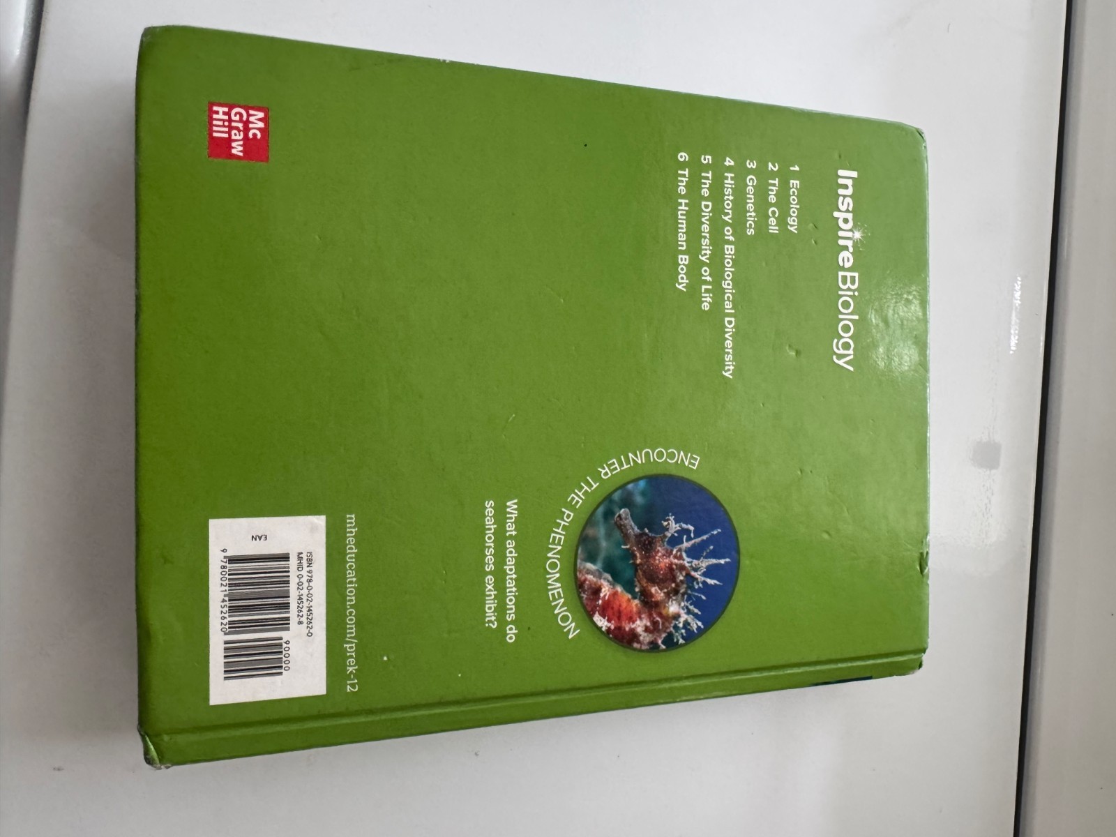 McGraw-Hill Inspire biology, Very good, one slightly ripped page, No doodles,