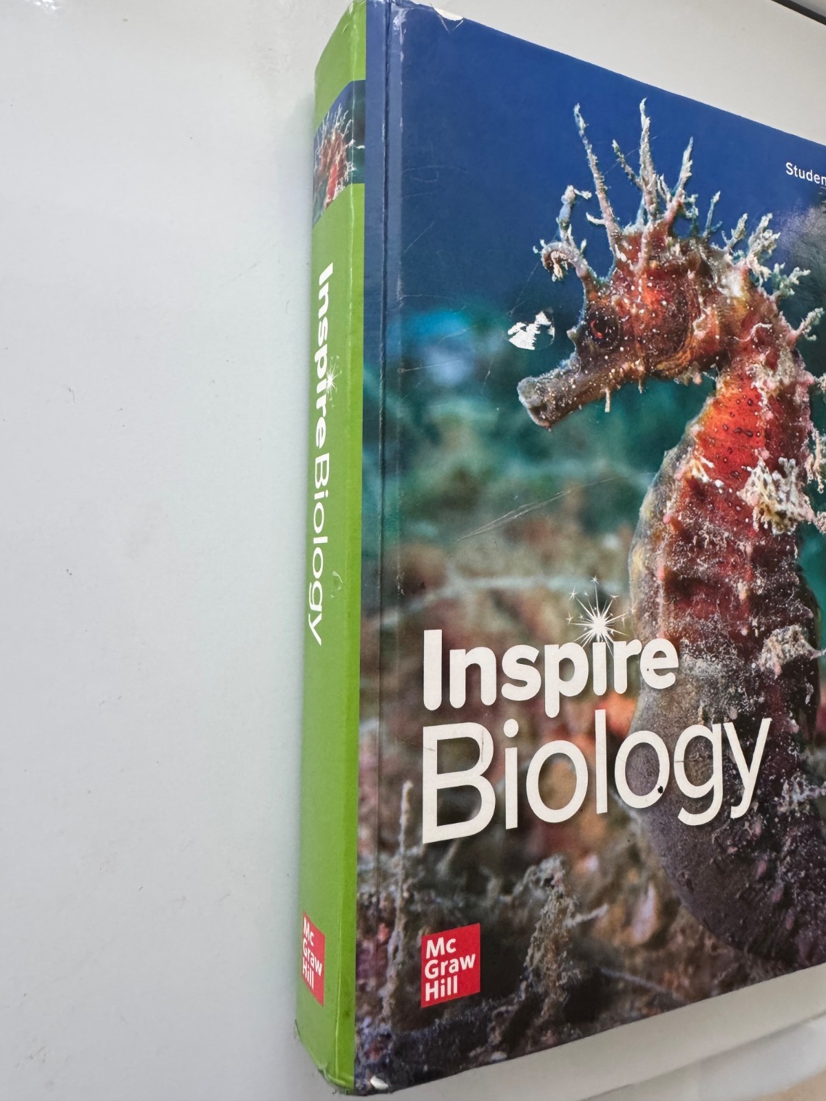 McGraw-Hill Inspire biology, Very good, one slightly ripped page, No doodles,