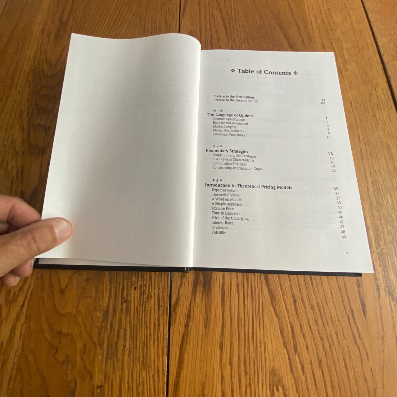 Option Volatility & Pricing: Advanced Trading Strategies & Techniques Hardcover